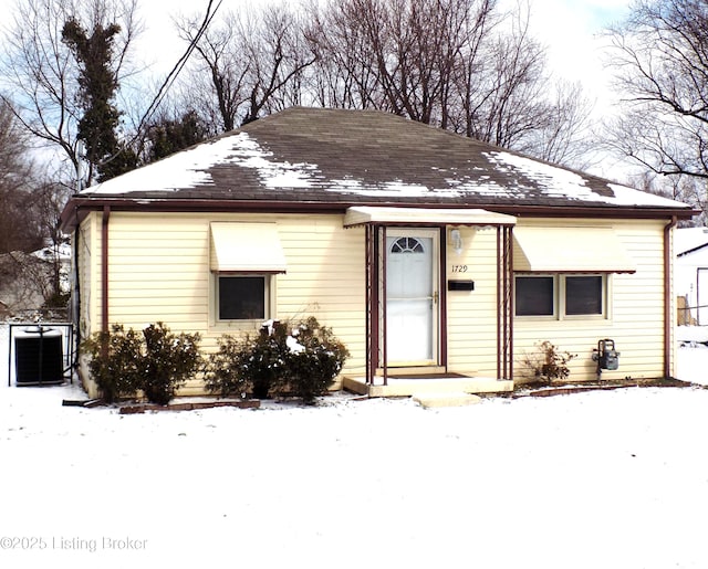 view of front of property with cooling unit