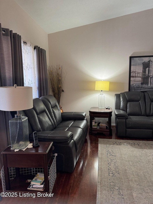 living area with hardwood / wood-style floors