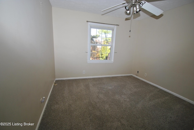 empty room featuring ceiling fan, carpet floors, and baseboards