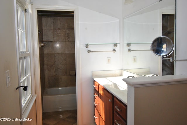 bathroom featuring vanity and bathing tub / shower combination