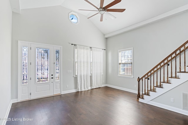 entryway featuring high vaulted ceiling, a ceiling fan, stairway, and wood finished floors