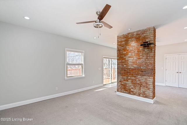 carpeted empty room featuring baseboards, a ceiling fan, and recessed lighting