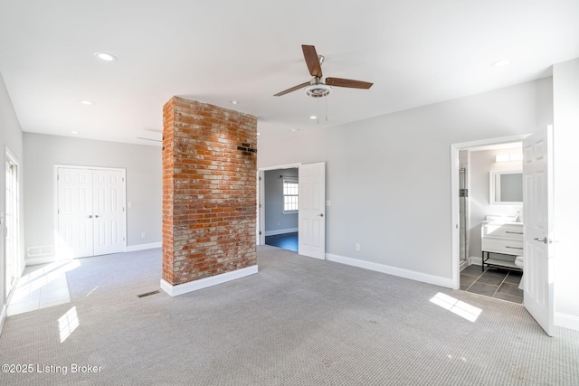 unfurnished bedroom featuring baseboards, carpet flooring, and recessed lighting