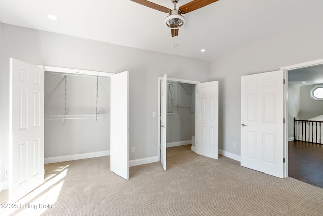 unfurnished bedroom featuring recessed lighting, light carpet, ceiling fan, and baseboards