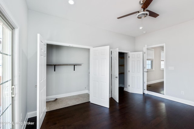 unfurnished bedroom featuring a ceiling fan, recessed lighting, baseboards, and wood finished floors