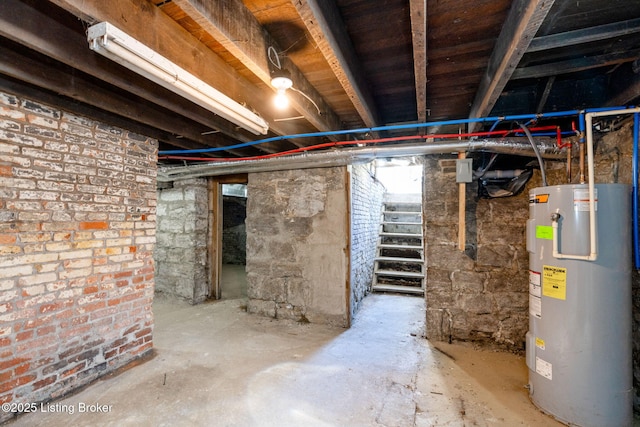 unfinished below grade area with water heater and stairway