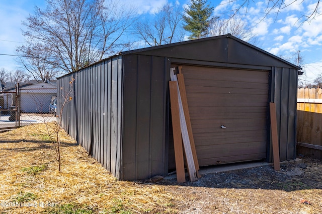 garage featuring fence