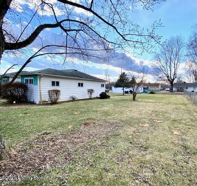 view of yard with fence