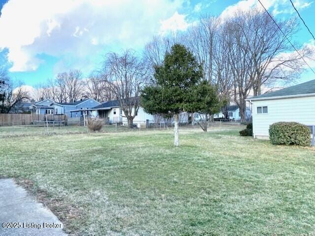 view of yard with fence