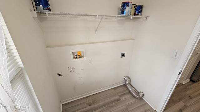 laundry room featuring washer hookup, hookup for an electric dryer, wood finished floors, laundry area, and baseboards