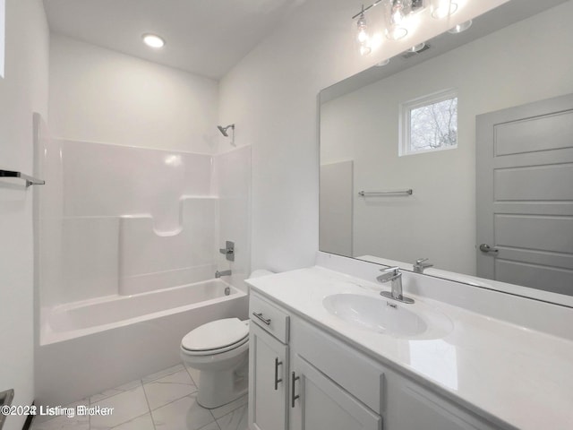 full bath with toilet, marble finish floor, shower / bathing tub combination, and vanity