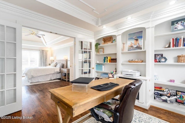 office with a ceiling fan, ornamental molding, and dark wood-style flooring