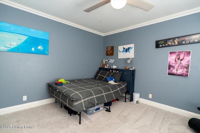 carpeted bedroom featuring crown molding, baseboards, and ceiling fan