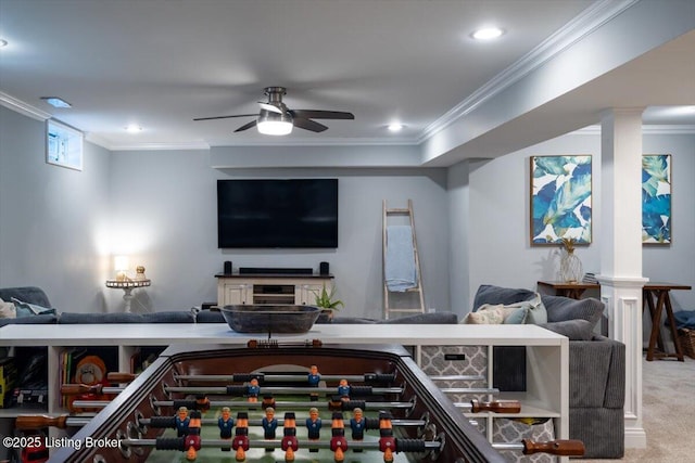 playroom with ceiling fan, ornamental molding, and carpet flooring