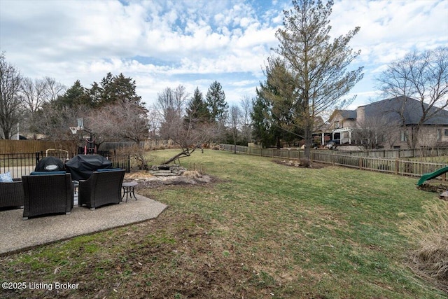 view of yard with a fenced backyard and a patio