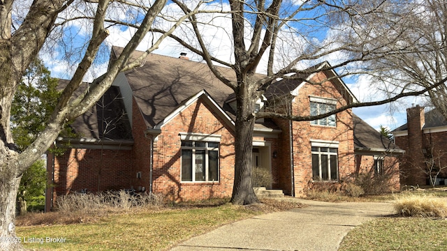 traditional home with brick siding