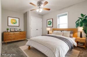 bedroom featuring carpet floors, a closet, and a ceiling fan