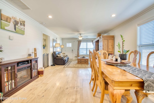 8105 Cedar Crest Ln, Louisville, KY 40291 - dining space featuring light wood finished floors, ceiling fan, ornamental molding, recessed lighting, and baseboards