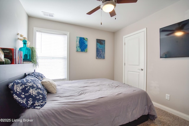 8105 Cedar Crest Ln, Louisville, KY 40291 - carpeted bedroom with baseboards and ceiling fan