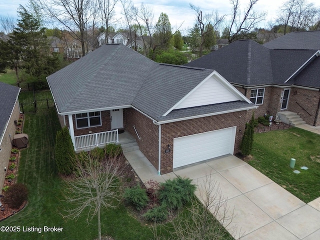 8105 Cedar Crest Ln, Louisville, KY 40291 - view of front of house featuring brick siding, a garage, a front yard, and concrete driveway