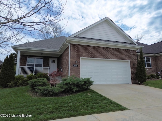 8105 Cedar Crest Ln, Louisville, KY 40291 - view of front of home featuring brick siding, a front yard, concrete driveway, and covered porch