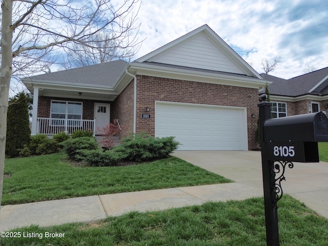 8105 Cedar Crest Ln, Louisville, KY 40291 - view of front facade with brick siding, a front yard, driveway, and an attached garage