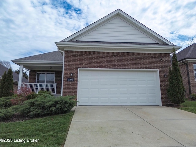 8105 Cedar Crest Ln, Louisville, KY 40291 - view of front of home featuring brick siding, driveway, and a porch