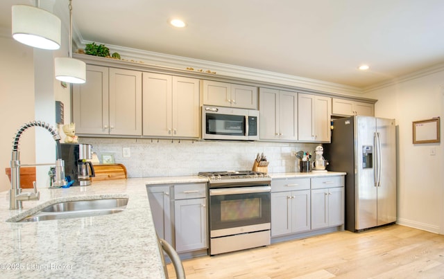 8105 Cedar Crest Ln, Louisville, KY 40291 - kitchen featuring appliances with stainless steel finishes, gray cabinetry, a sink, ornamental molding, and recessed lighting