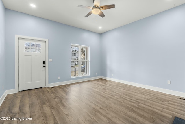 entrance foyer featuring recessed lighting, wood finished floors, a ceiling fan, and baseboards