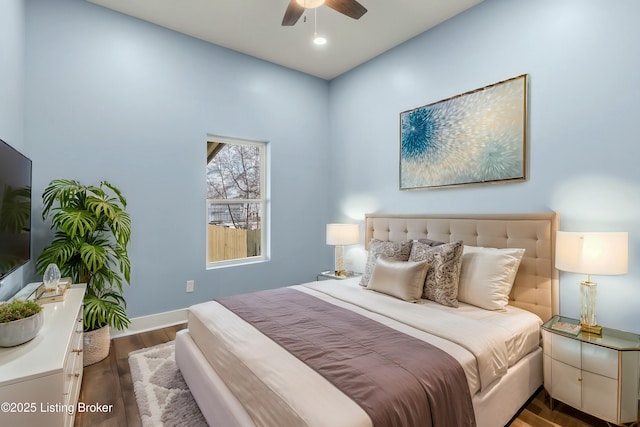 bedroom featuring ceiling fan, recessed lighting, wood finished floors, and baseboards