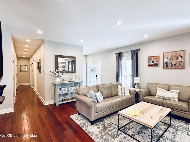 living area with recessed lighting, dark wood finished floors, and baseboards