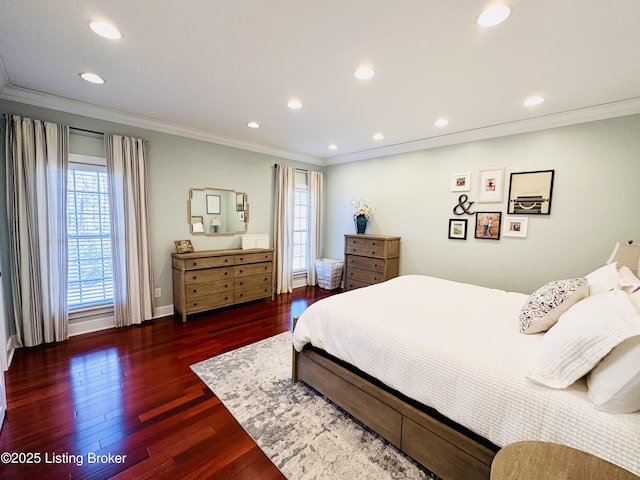 bedroom with recessed lighting, crown molding, baseboards, and wood finished floors