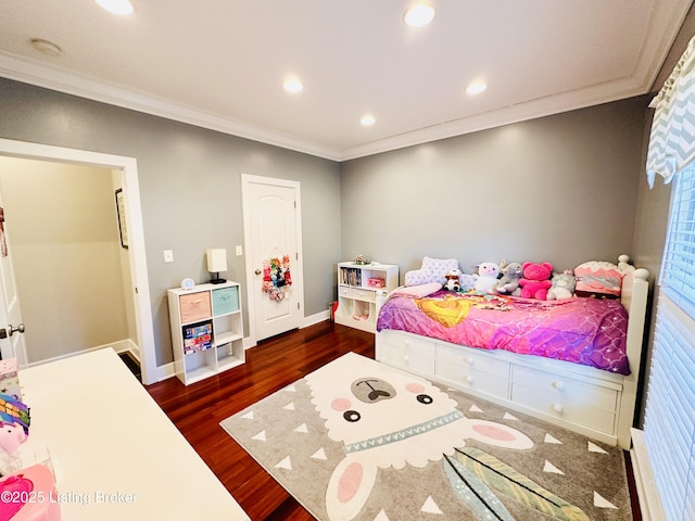 bedroom featuring dark wood-type flooring, recessed lighting, crown molding, and baseboards