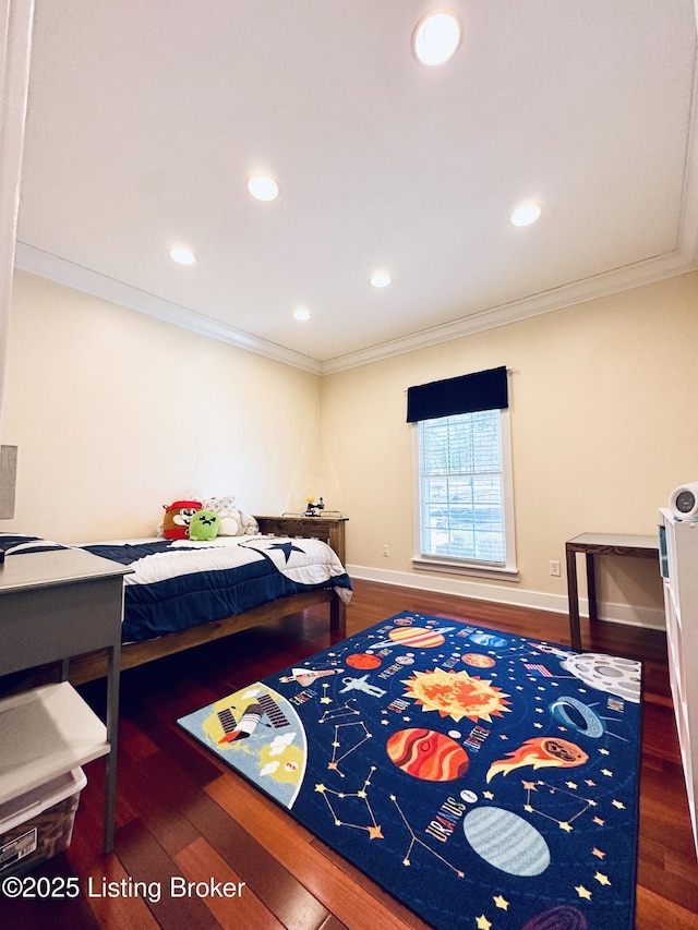 bedroom featuring recessed lighting, crown molding, baseboards, and wood finished floors