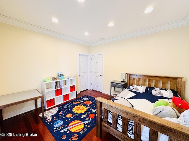 bedroom with recessed lighting, wood finished floors, and crown molding