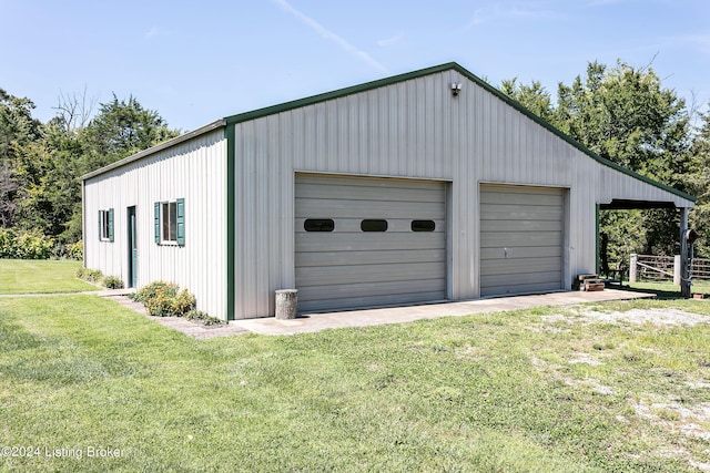 garage with a garage and driveway