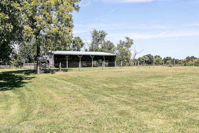 view of yard with an outbuilding and an exterior structure