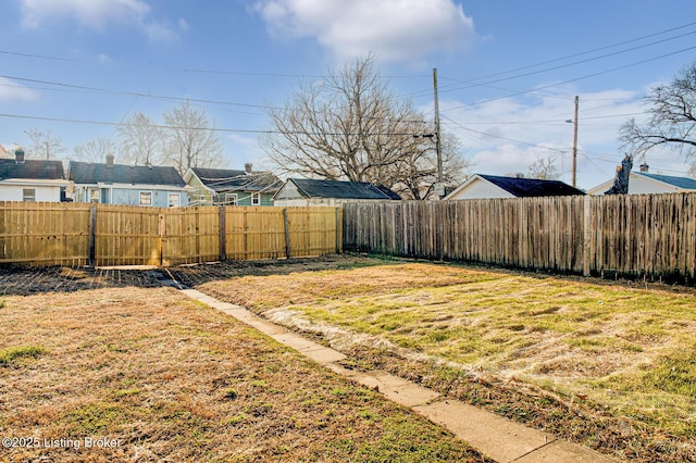 view of yard featuring a fenced backyard