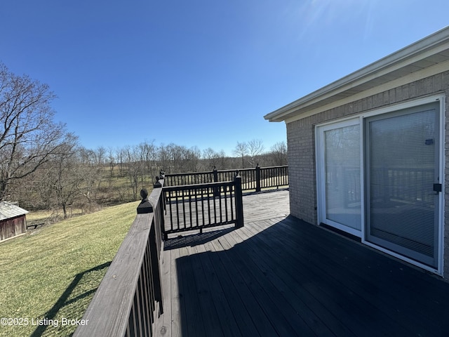 deck featuring a lawn