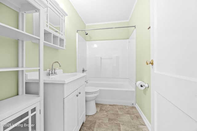 bathroom with crown molding, bathtub / shower combination, toilet, vanity, and baseboards