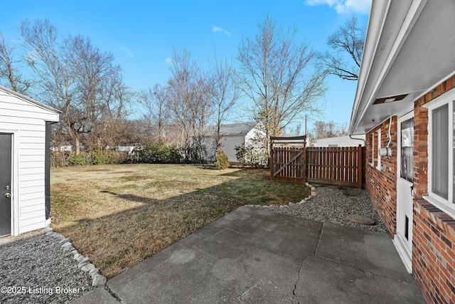 view of yard with a patio area and fence