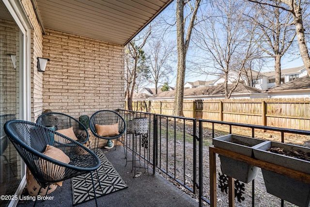 balcony featuring a residential view