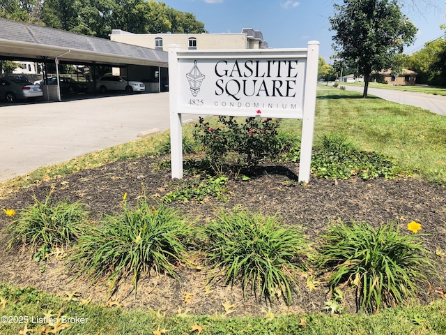 community / neighborhood sign with covered parking