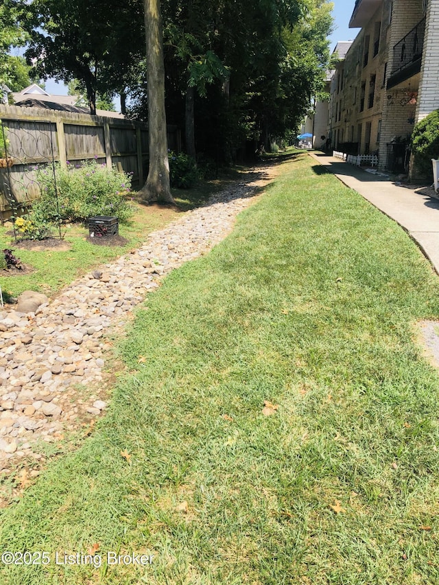 view of yard featuring fence