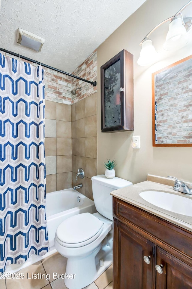 full bath featuring a textured ceiling, toilet, vanity, tile patterned floors, and shower / tub combo with curtain