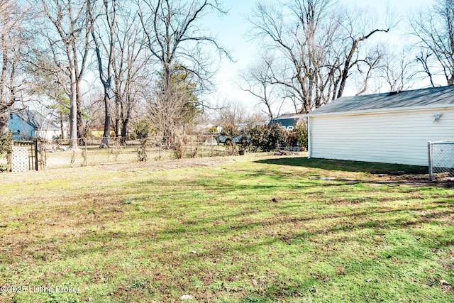 view of yard featuring fence