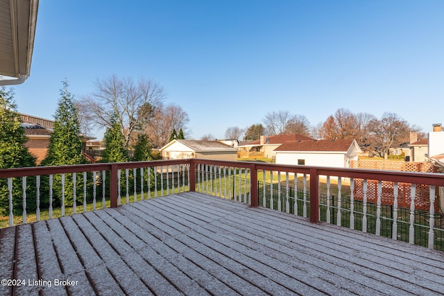 wooden deck featuring a residential view