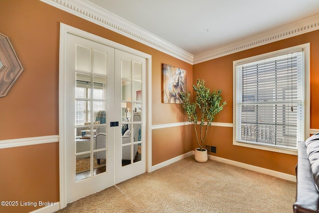 doorway to outside with french doors, crown molding, visible vents, carpet flooring, and baseboards