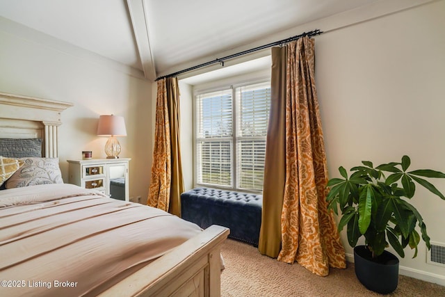 bedroom featuring light colored carpet, visible vents, and baseboards