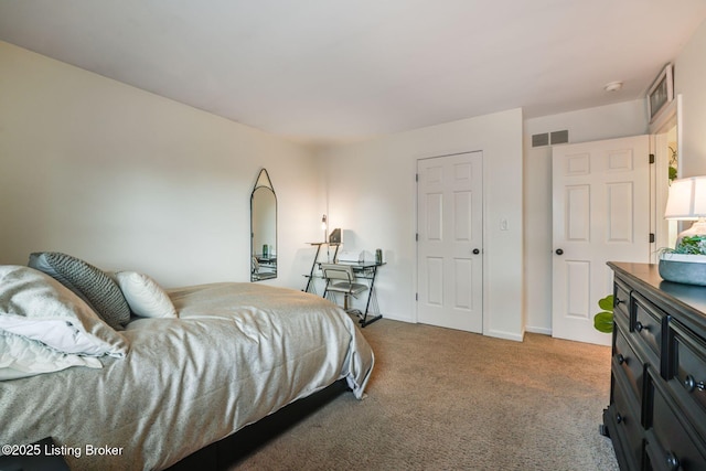 carpeted bedroom with visible vents